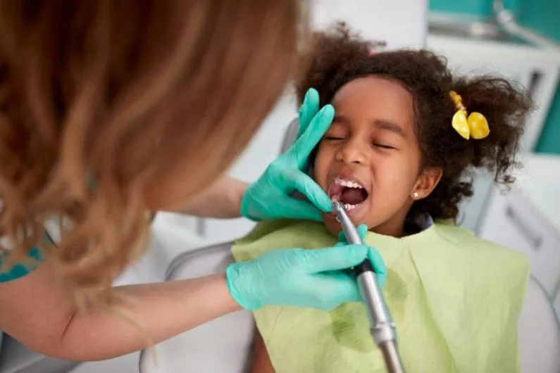 a child undergoing dental procedure